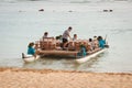 Lantern Ceremony Volunteers Depart on Boat with Lanterns